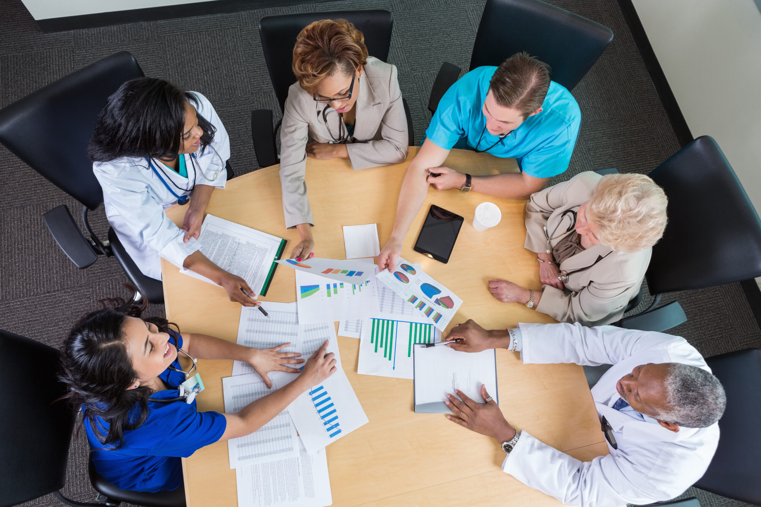 Hospital board members meeting to discuss financial issues and policies